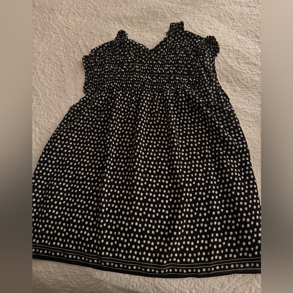 Sleeveless ruffle blouse